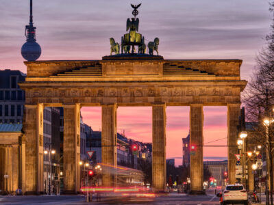 famous-brandenburg-gate-berlin-with-television-tower-before-sunrise
