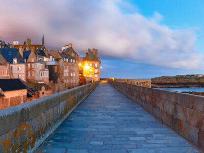 Night panoramic view of beautiful walled city Intra-Muros in Saint-Malo, also known as city corsaire, Brittany, France