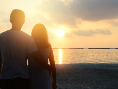 Loving couple on the beach. Couple in love.  Maldives vacation. Lifestyle. Travel, vacation, love, romance, sunrise.
