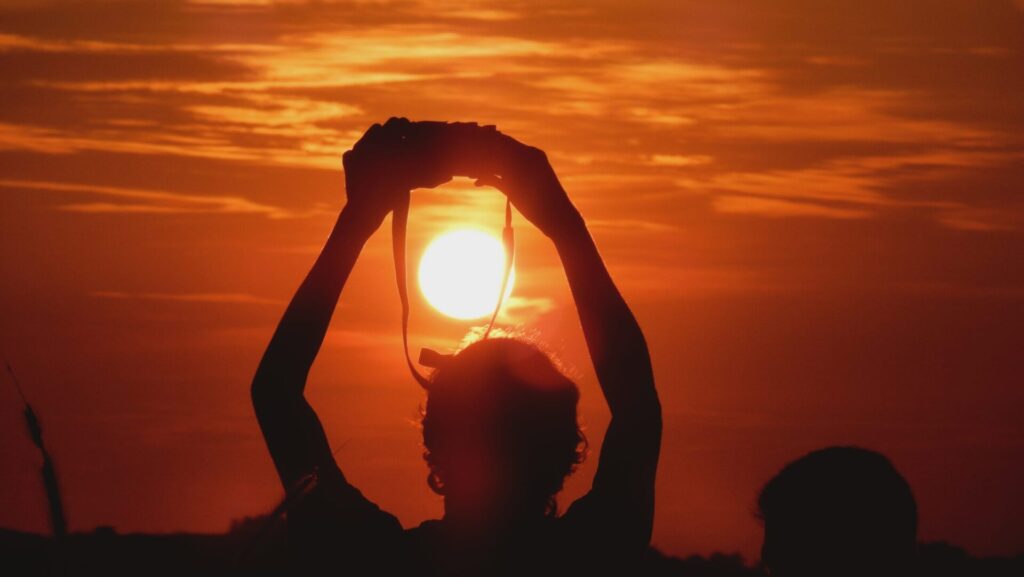Silhouette watching the total solar eclipse over Spain’s Atlantic coast during the August 2026 group tour with Terra Trips