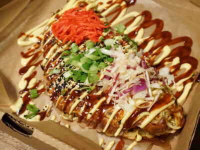 close-up-okonomiyaki-japanese-style-savory-pancake-made-with-flour-eggs-shredded-cabbage-meat