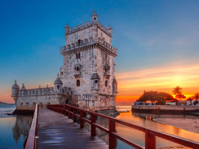 Belem Tower or Tower of St Vincent on the bank of the Tagus River at scenic sunset, Lisbon, Portugal